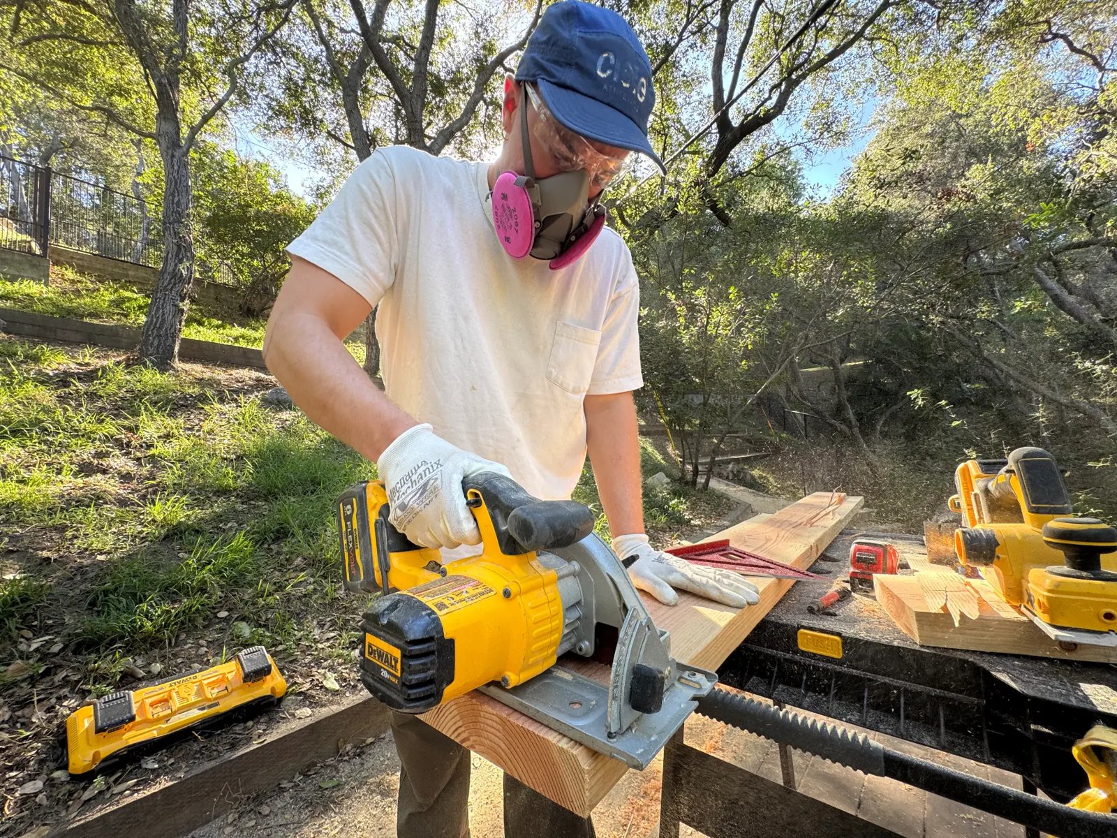 Cutting lumber outdoors for a woodworking project