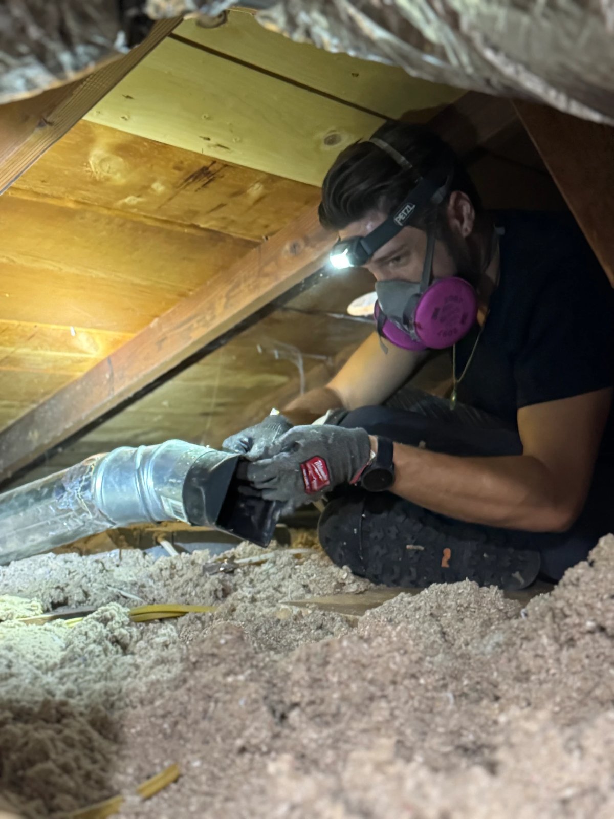 Working on a home project in an attic