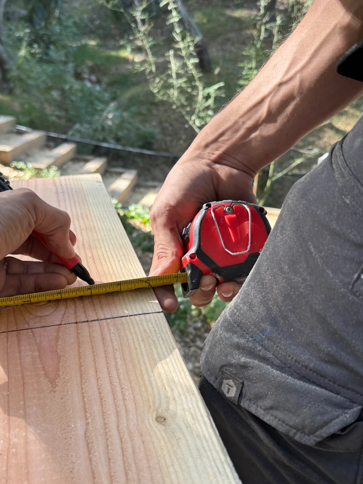 Measuring a board for a custom carpentry project